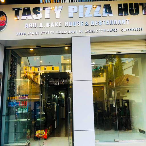 Delicious handcrafted pizzas and fast food at Tasty Pizza Hut in Kalmunai, Sri Lanka – your go-to spot for flavorful, oven-fresh pizza